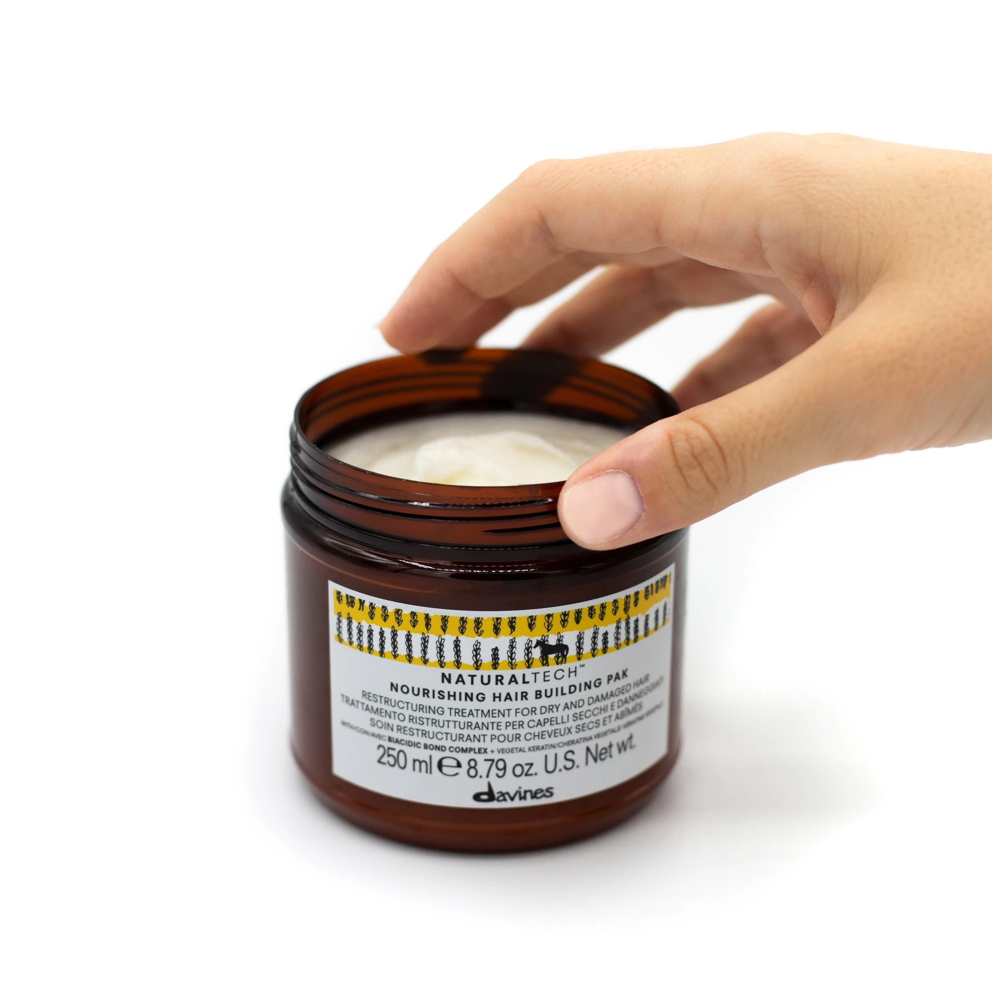 Davines Nourishing Hair Building Pak Yıpranmış Kuru Saç Maskesi 250 ml – Saç tellerini güçlendiren ve yeniden yapılandıran besleyici saç bakım maskesi.